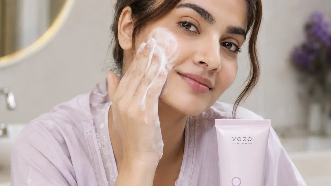 Woman applying YOZO Snow Skin Purifying Cleanser as the first step in a simple skincare routine