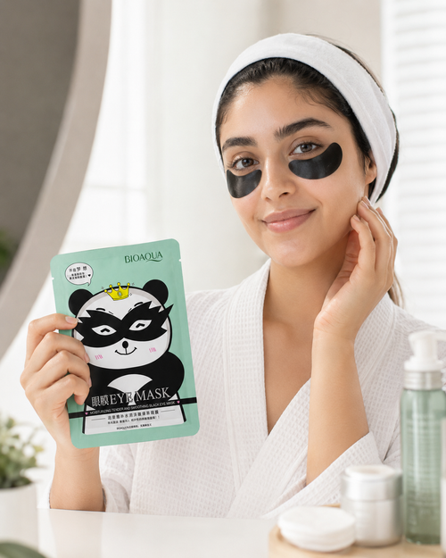 Woman applying eye masks | BIOAQUA Soothing Black Eye Mask